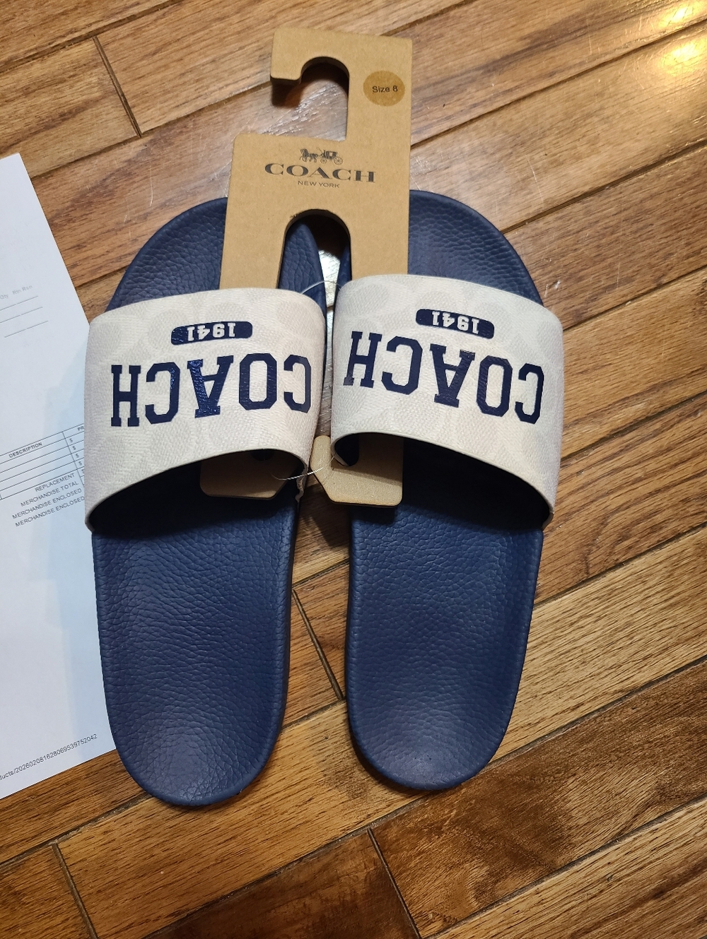 Coach Slides Signature with Varsity Logo